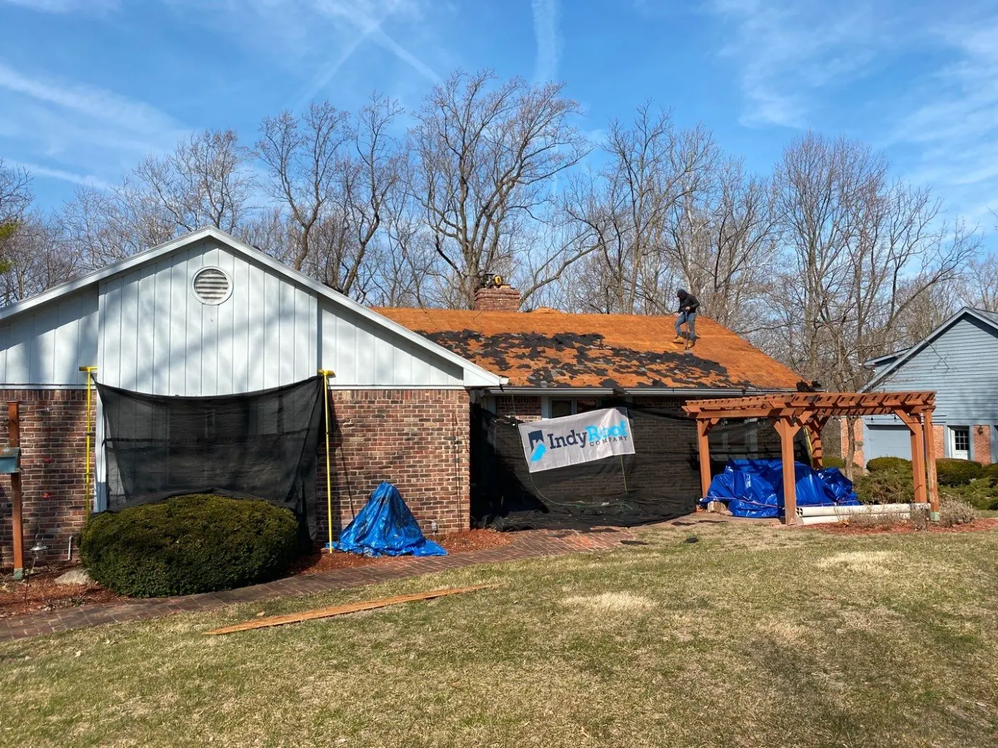 Tarping and dry-in on a Traders Point commercial roof